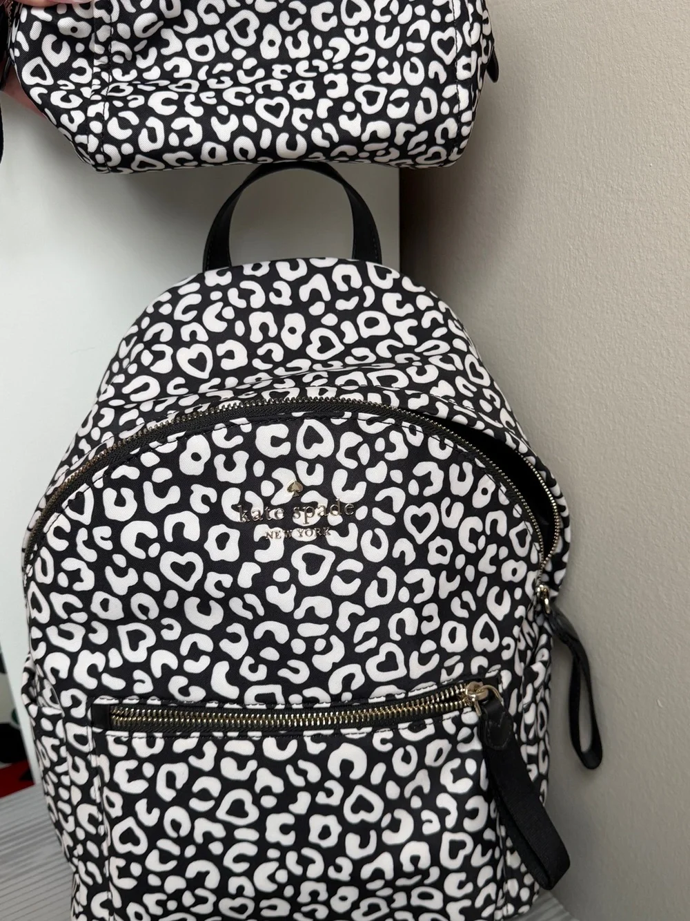 kate spade Black and White Leopard-Print Mini Backpack with cosmetics bag